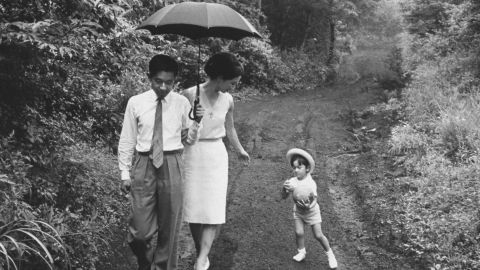 Akihito and Michiko with their son Naruhito in 1964. The couple often broke with tradition, opting to raise their own children. "They (the couple) wanted to show they were not reigning, but rather, they were just like us."