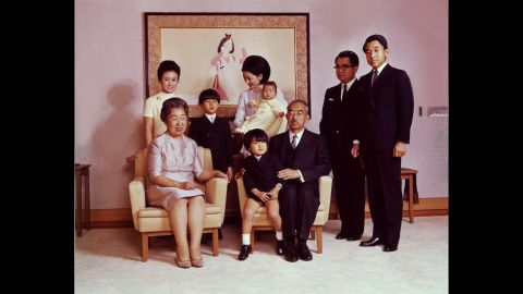 In a 1969 portrait, Emperor Hirohito and Empress Nagako pose with their children and grandchildren. Crown Prince Akihito stands on the far right. 