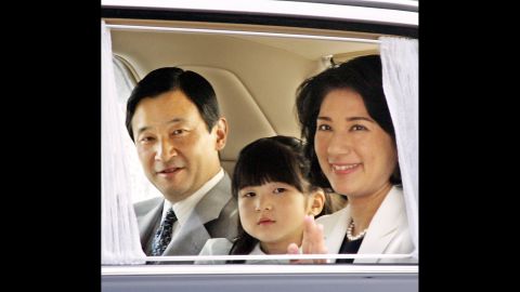 Akihito's eldest son and heir-apparent, Crown Prince Naruhito, granddaughter Princess Aiko, and Crown Princess Masako enter the Imperial Palace in Tokyo on September 2, 2006.       