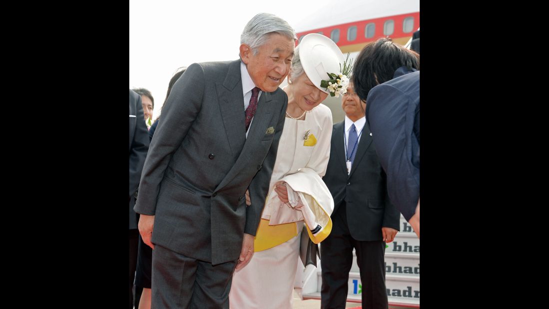 Emperor Akihito and Empress Michiko are greeted at Chennai International Airport in India on December 4, 2013, after arriving from New Delhi on the second leg of their weeklong trip to India. This was the first time they had been to India in 53 years.