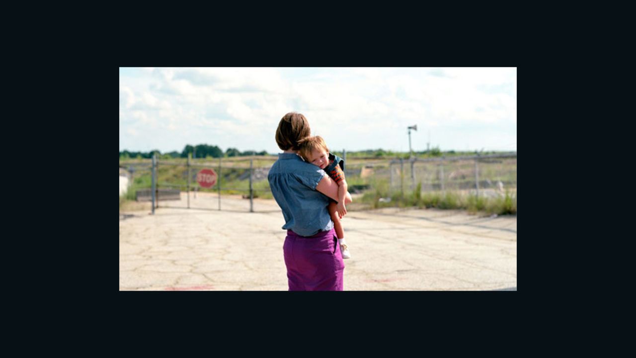 Hannah Palmer and her son explore the area near the Atlanta airport where her childhood homes once stood.