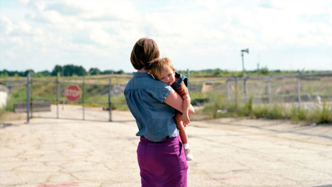 Hannah Palmer and her son explore the area near the Atlanta airport where her childhood homes once stood.