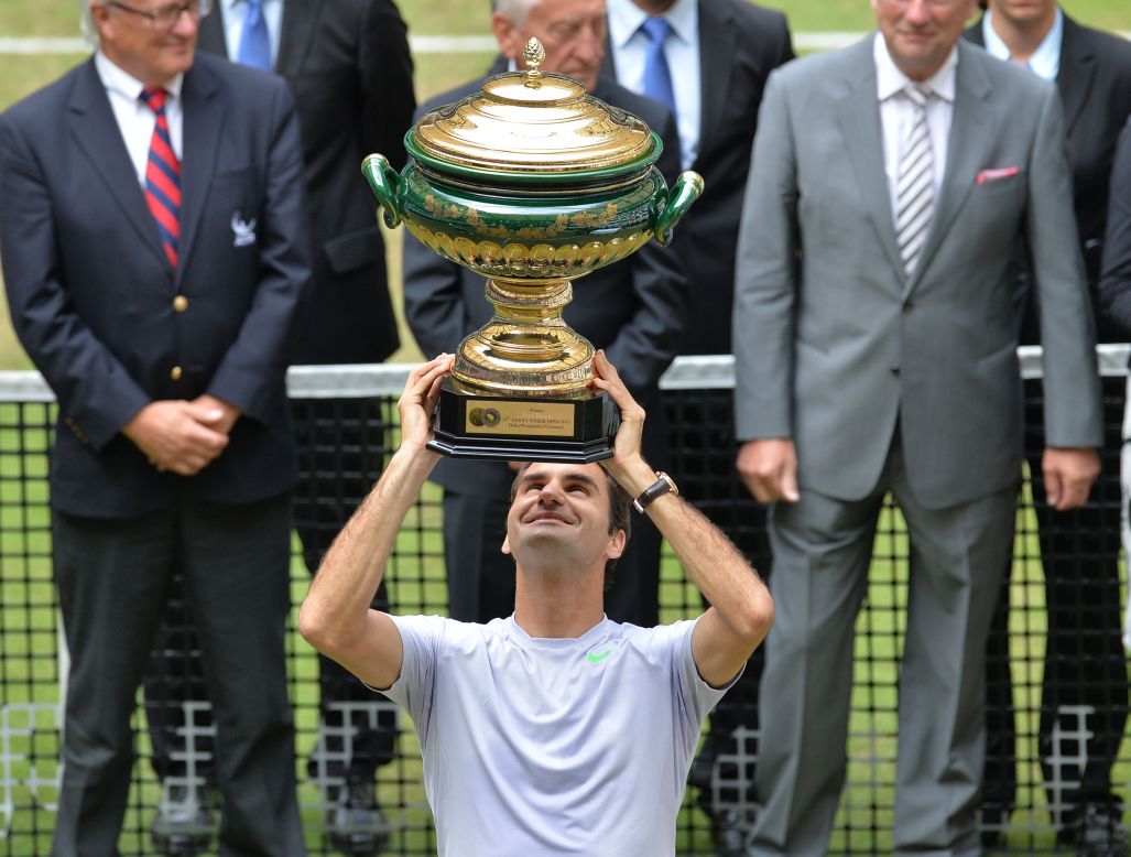 Federer wants to win "about" five tournaments in 2014 and play in more "great" finals. "My ranking is less important to me, unless it's about being number one," the world No. 6 said. "But it would be good to be in the top four or top eight, to get good seedings."