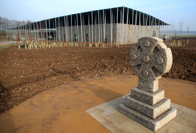 The elegant pavilion of glass and weathered wood forms a new gateway to the enigmatic millennium-old monument.