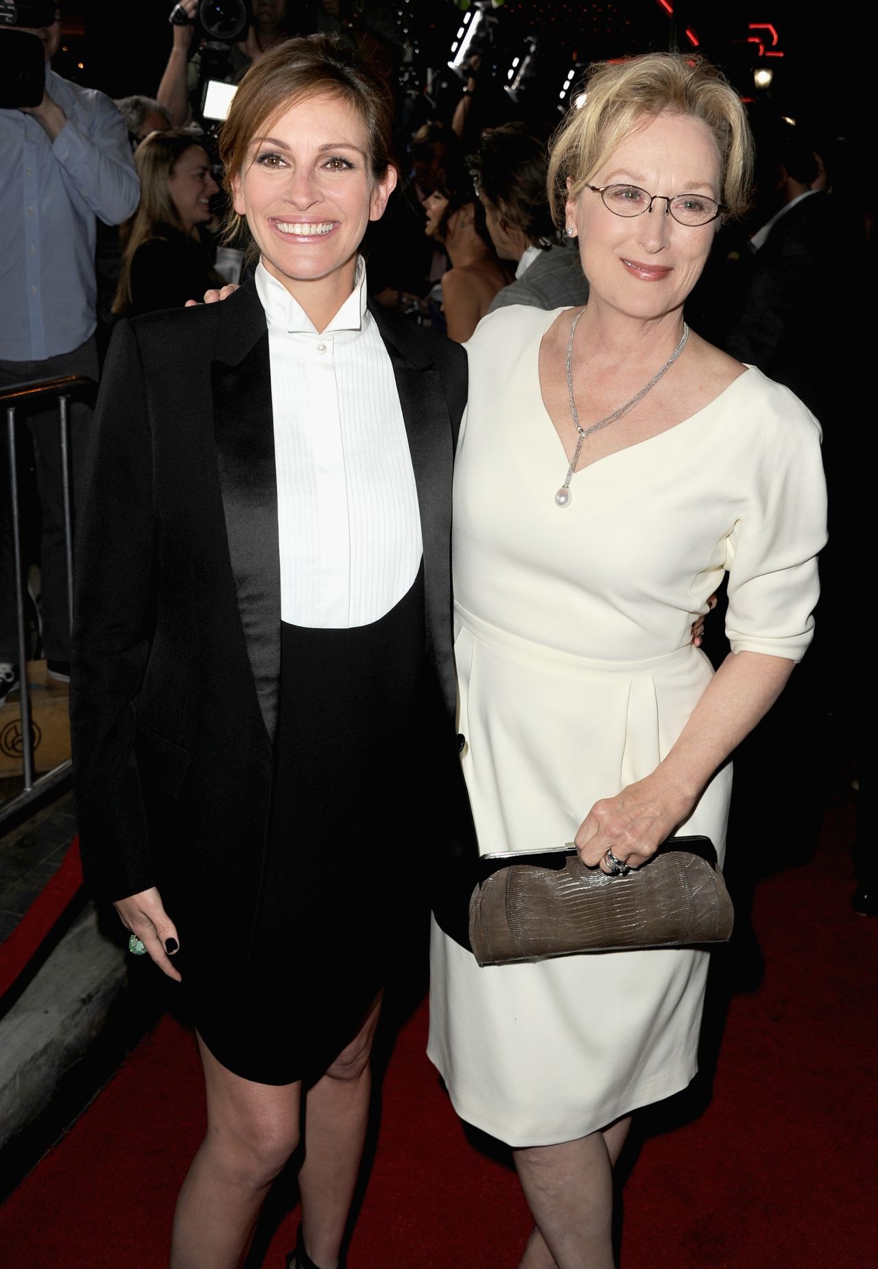 Julia Roberts and Meryl Streep stay by each other's side at the "August: Osage County" premiere in Los Angeles on December 16.