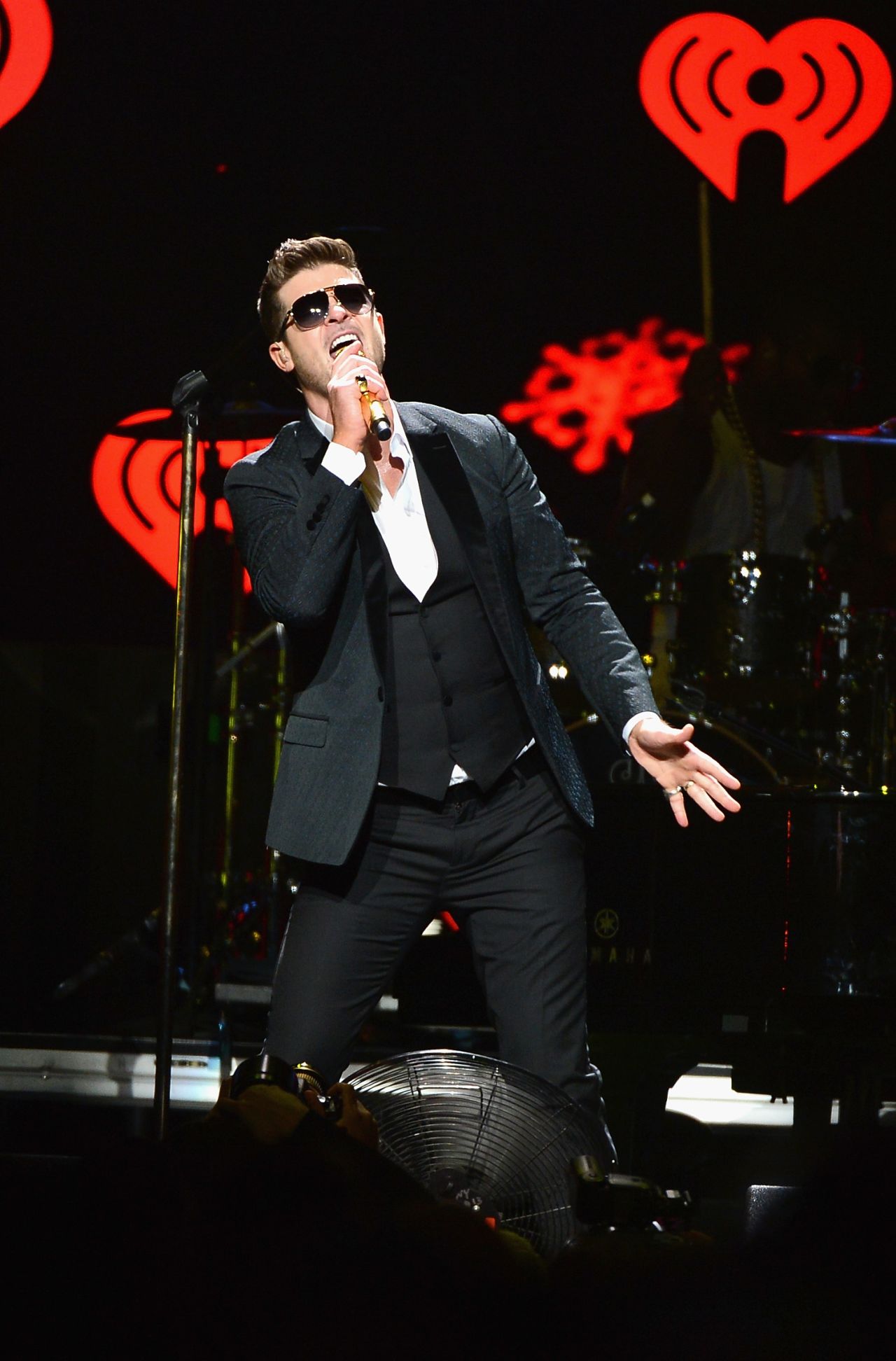 Robin Thicke gets into the groove at Hot 99.5's Jingle Ball 2013 in Washington D.C. on December 16.