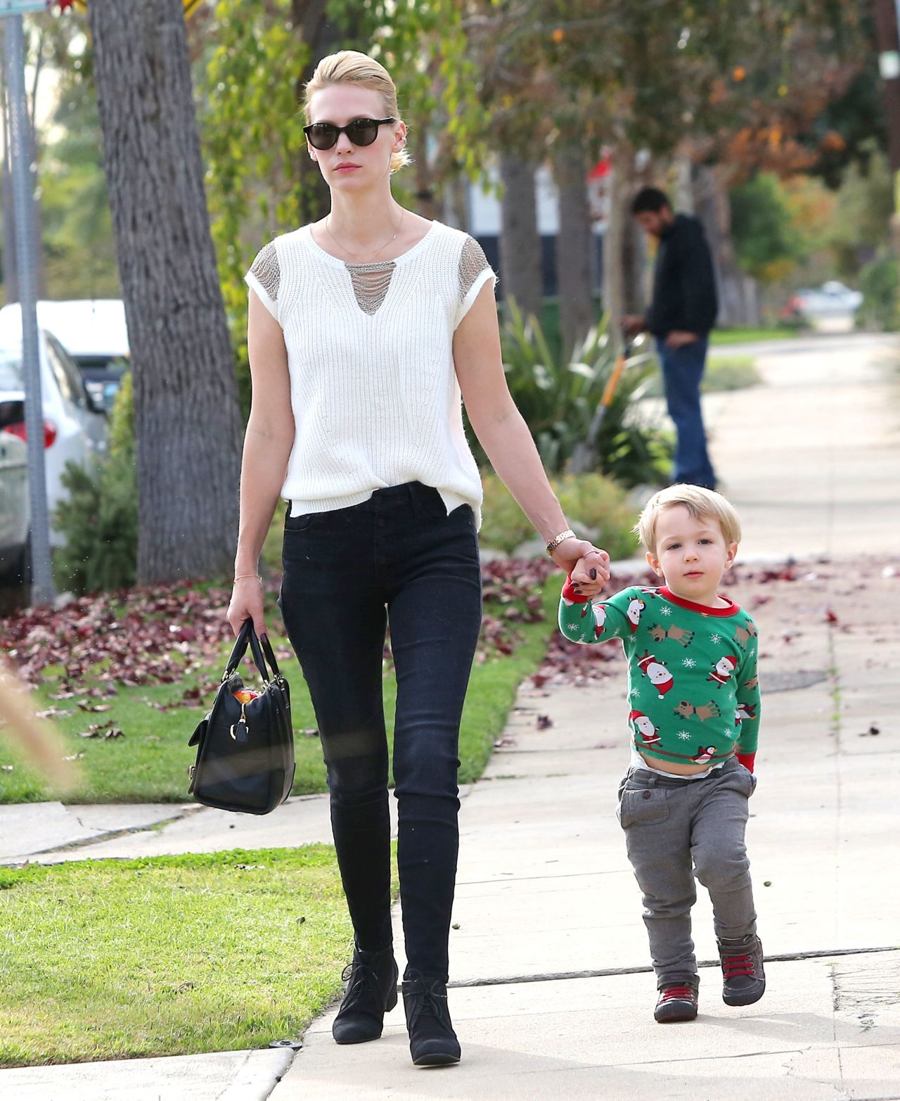 January Jones and her son Xander keep in step on December 17.