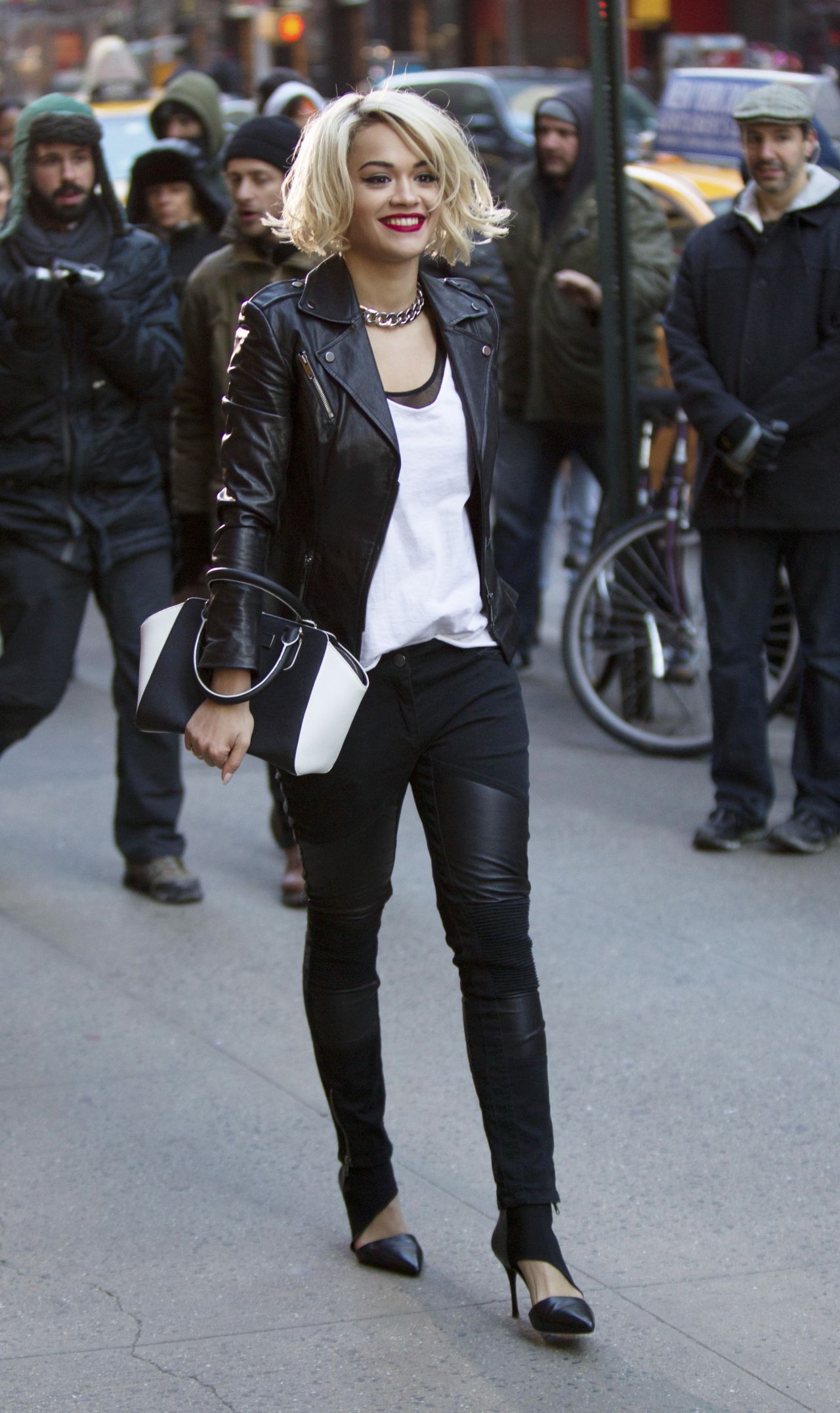 Rita Ora works the camera for a DKNY campaign on December 16.