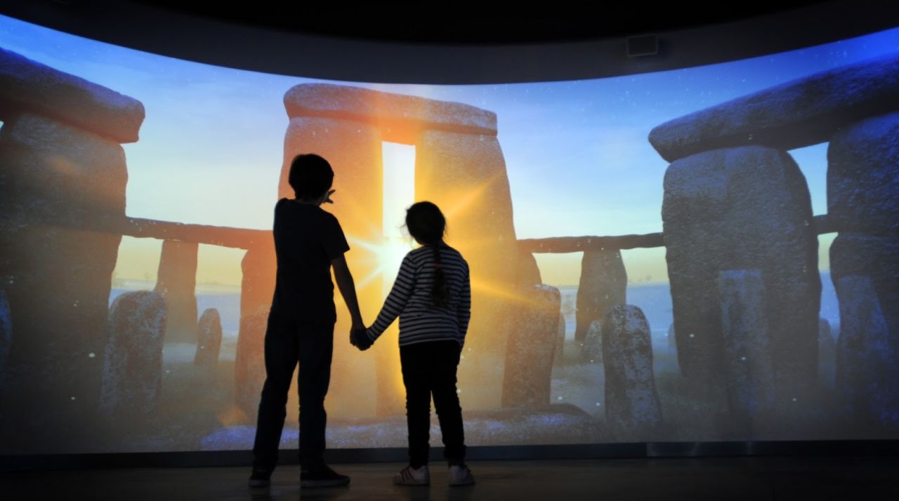 Another exhibit lets visitors experience -- virtually -- dawn from the center of the stone circle. Minus typical English drizzle.  