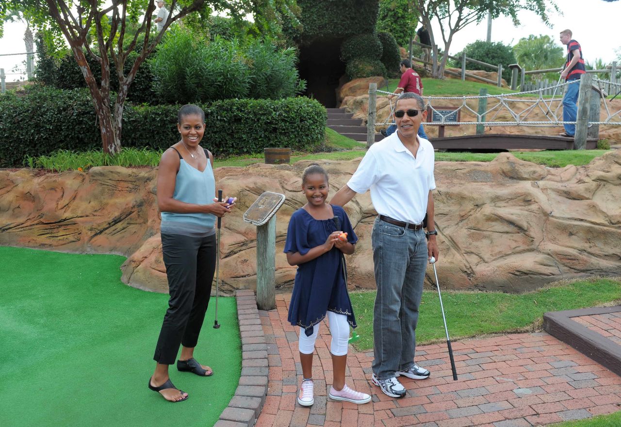 Minigolf is a popular family activity, even in the the White House -- here the Obamas take to the course in 2010. Families all over the world enjoy playing a game which gets them outdoors and, unlike conventional golf, doesn't take all day to finish.