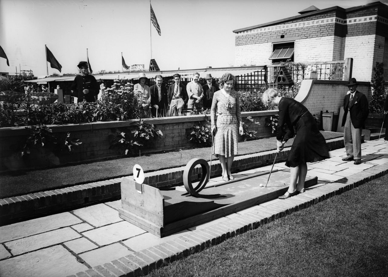 These women are seen playing in 1930, but minigolf dates back to 1867 -- when the Royal and Ancient Golf Club sought to deter females from playing the "unladylike" full version of the game. 