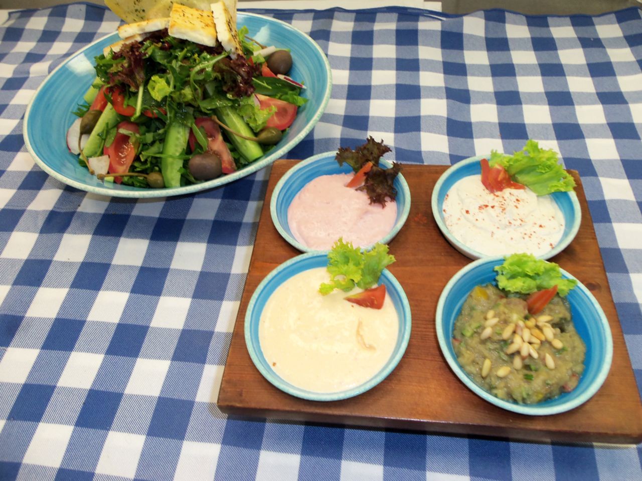 A spread of small dishes for a Mediterranean or Middle Eastern breakfast, lunch or dinner.