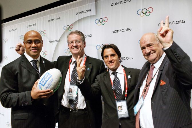 (From left to right) New Zealand rugby legend Jonah Lomu, International Rugby Board president Bernard Lapasset, Argentina's rugby chief Porfirio Carreras and French counterpart Pierre Camou celebrate after sevens was included as a sport for the 2016 Olympic Games in Rio de Janeiro.