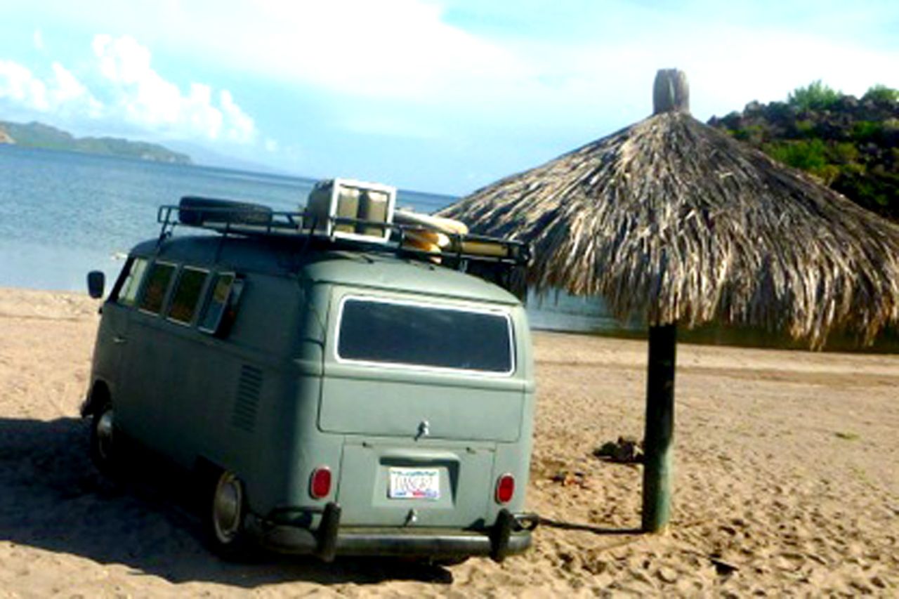 Kombis became the vehicle/hangout of choice for surfers and hippies in the 1960s. "The Kombi exemplifies the free spirit of peace activists, lovers, world travelers and campers," says Garfield.