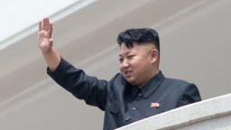 North Korean leader Kim Jong-Un waves to the crowd during a military parade at Kim Il-Sung square marking the 60th anniversary of the Korean war armistice in Pyongyang on July 27, 2013. North Korea mounted its largest ever military parade on July 27 to mark the 60th anniversary of the armistice that ended fighting in the Korean War, displaying its long-range missiles at a ceremony presided over by leader Kim Jong-Un. AFP PHOTO / Ed Jones (Photo credit should read Ed Jones/AFP/Getty Images)