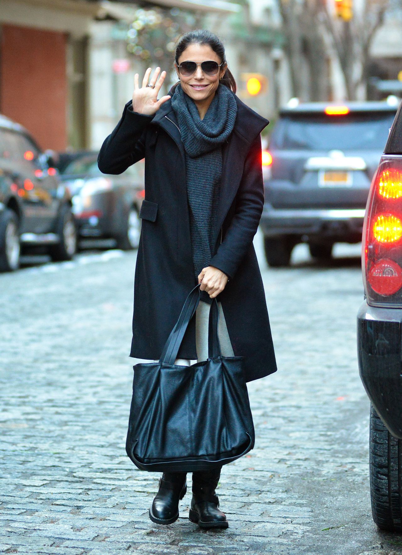 Bethenny Frankel is in good spirits when she spots photographers on December 18. 