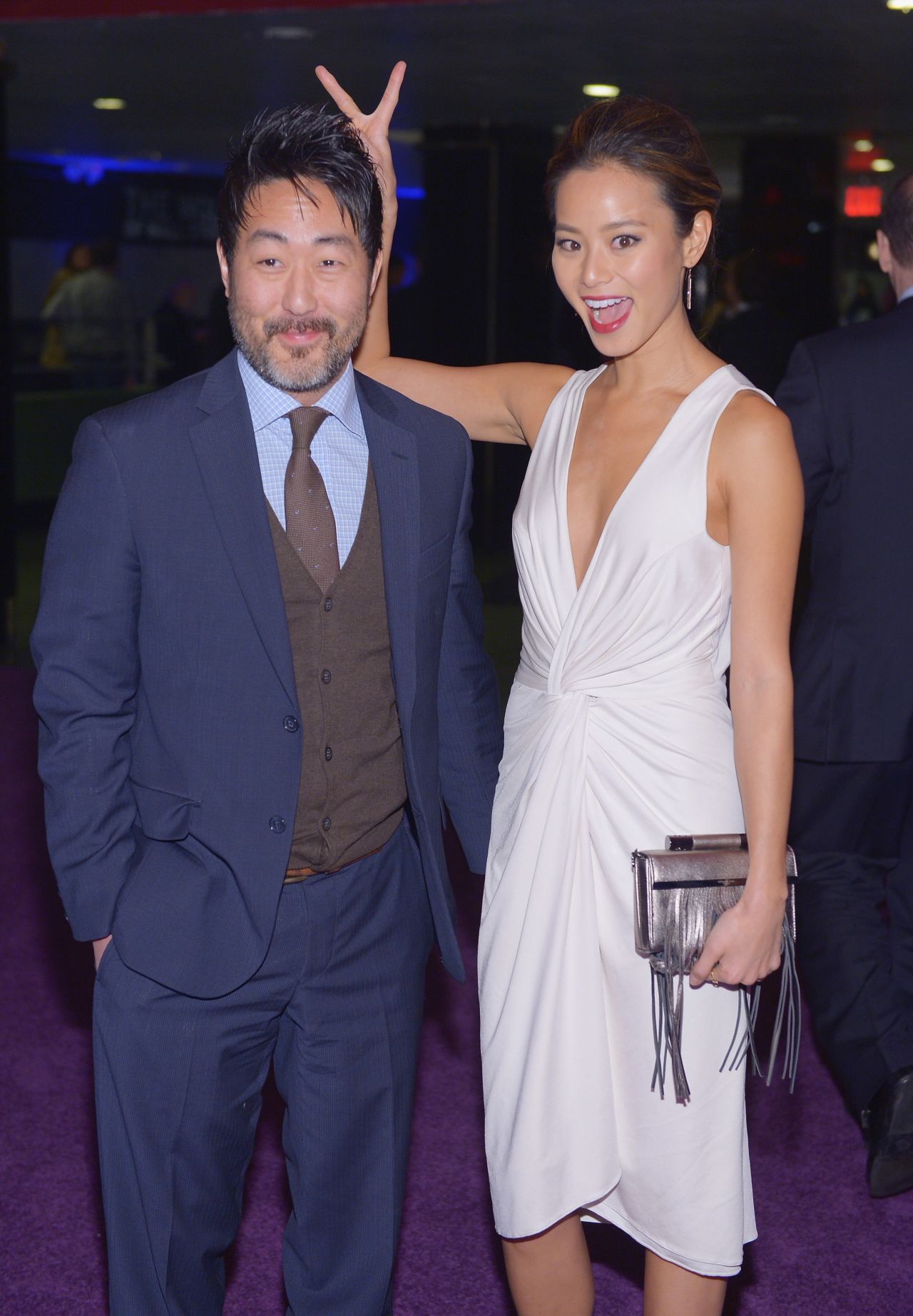 Kenneth Choi and Jamie Chung keep it light at the "Wolf of Wall Street" premiere after-party on December 17. 