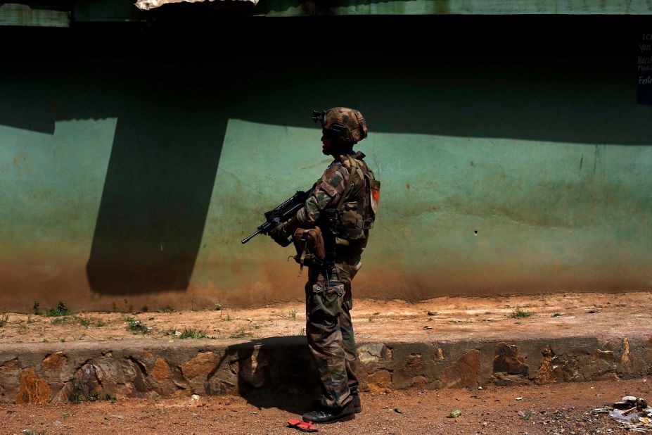 A French soldier patrols the Castor neighborhood of Bangui on Monday, December 16.