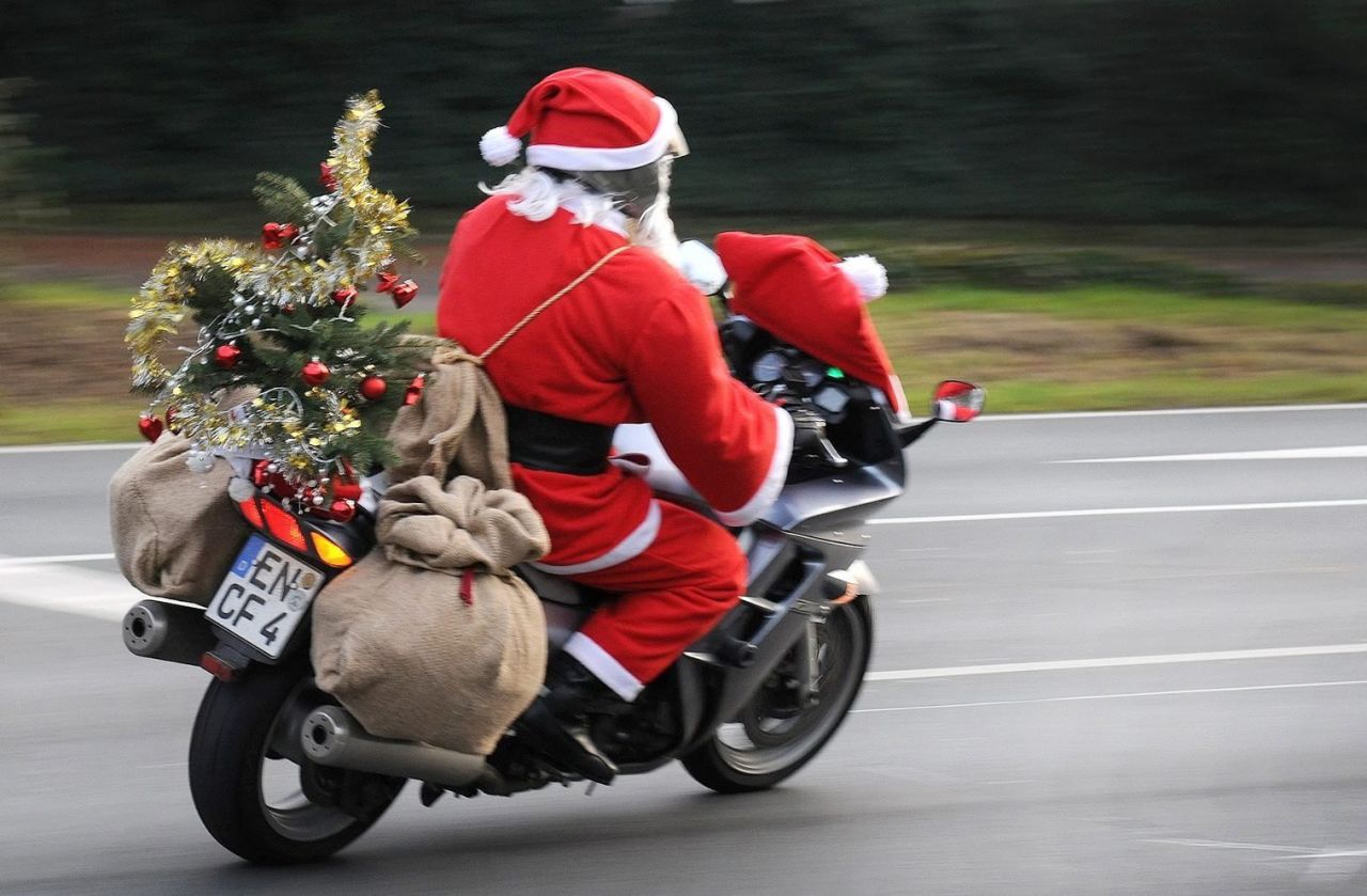 A man dressed as Santa Claus drives his motorcycle in Bochum, Germany, on December 18.