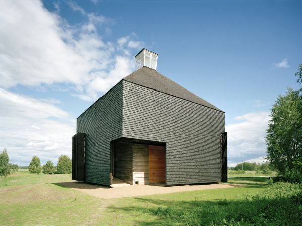 Built on the site of a demolished 18th century church, this minimalist chapel by Lassila Hirvilammi Architects was created using 18th century building techniques.