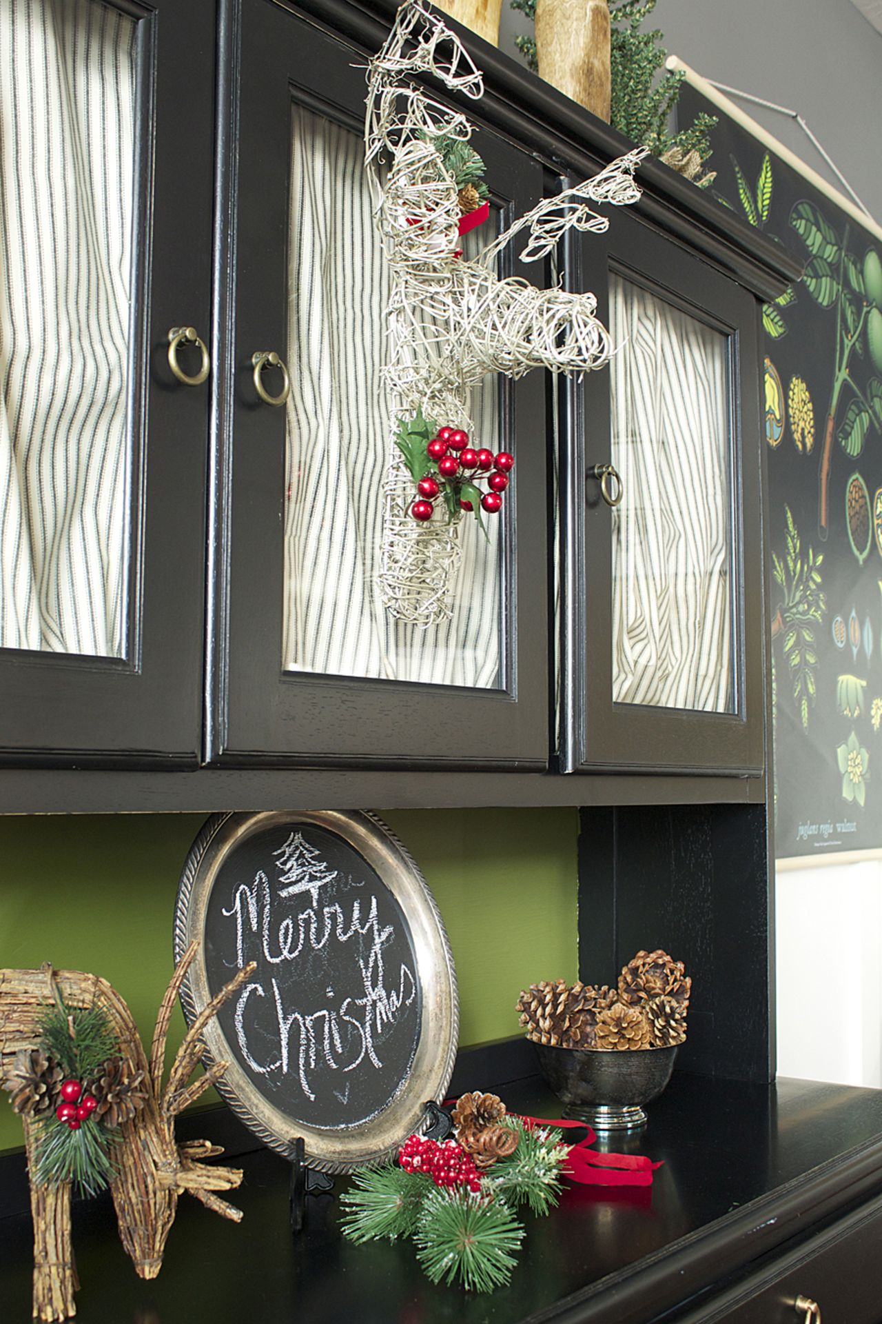 A trophy deer head made of vine lends a whimsical take on woodland Christmas decor.