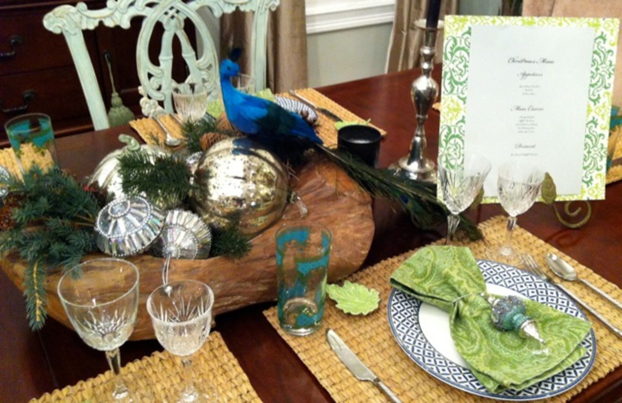 Rina Norwood layered peacocks and woodland botanicals for her Christmas decor.