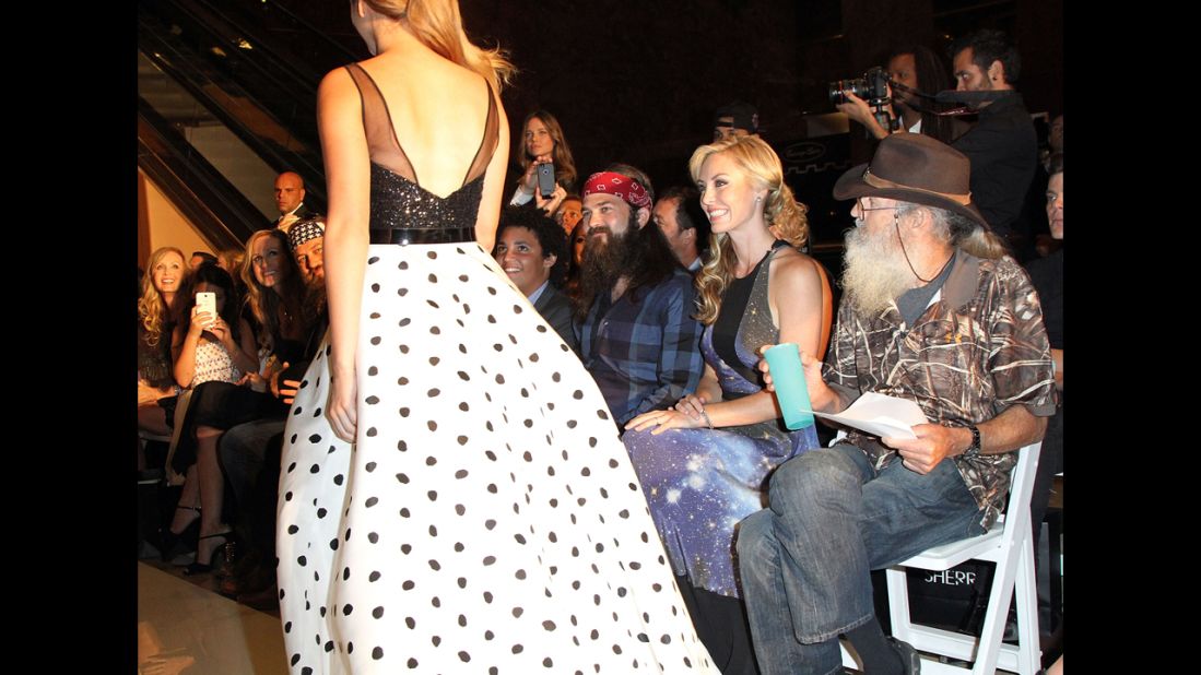 The Robertsons watch as Sadie Robertson, Willie and Korie's daughter, walks in a New York fashion show in September 2013.