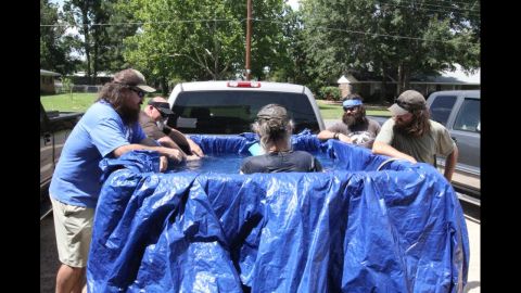 In a "Duck Dynasty" episode where the office air conditioning broke, Si tries to beat the heat by creating a pool in the back of his pickup truck.