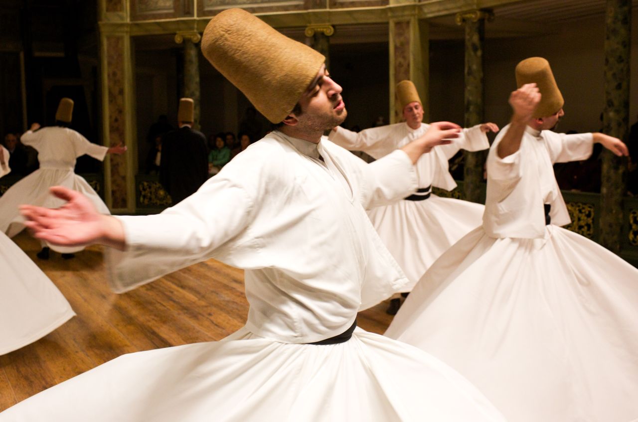 DECEMBER 19 - ISTANBUL, TURKEY: Whirling dervishes perform at the Galata Mevlevihane (The Lodge of the Dervishes) on December 18. The dervishes are followers of Sufism, a mystical form of Islam that preaches tolerance and a search for understanding. Those who whirl, like planets around the sun, turn dance into a form of prayer.