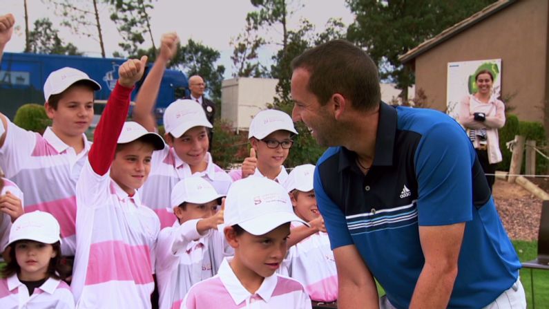 Garcia enjoying a joke with the kids of his junior golf academy at the PGA Catalunya Resort, Barcelona. The 33-year-old dropped by in October this year to celebrate its one-year anniversary. 