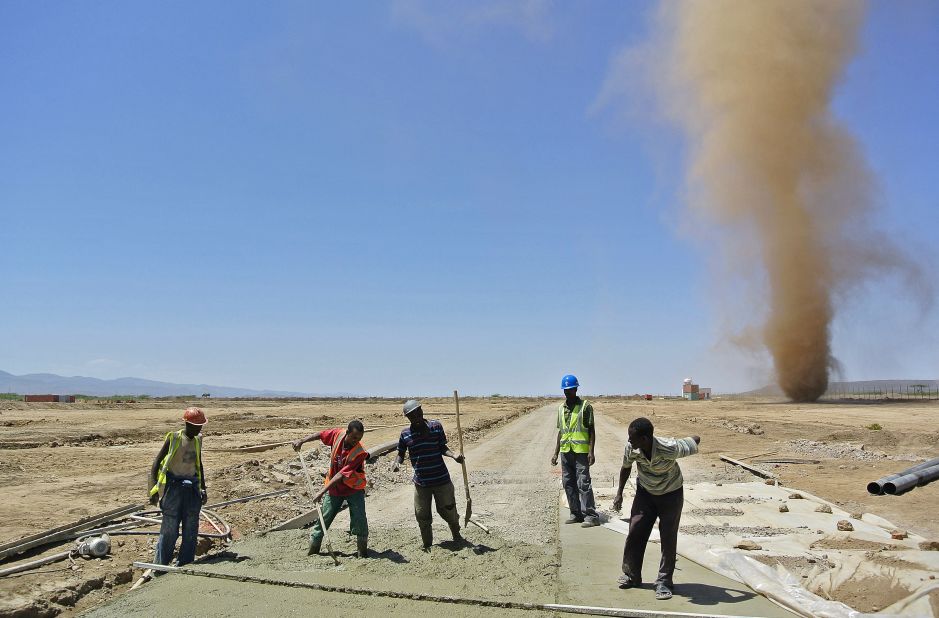 Men work at a construction site for a new Chinese-built railway in Ethiopia in 2013. The railway will connect<a href="http://www.erc.gov.et/index.php/projects.html?start=2" target="_blank" target="_blank"> Addis Ababa to Djibouti's Red Sea Port</a> at a cost of up to $2.8 billion. The new train line will be used for freight and passenger transport.