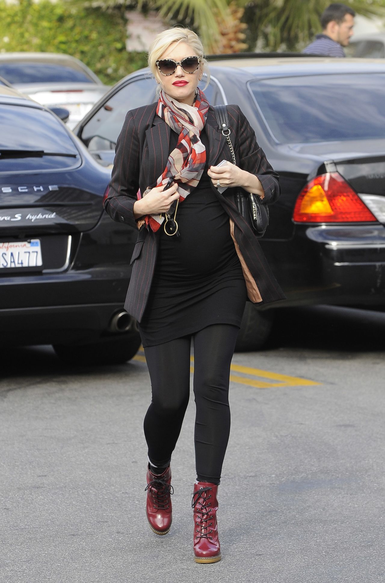 Gwen Stefani conceals a growing baby bump on December 18.