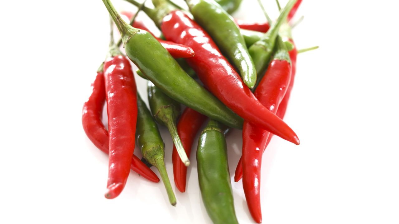 Chili peppers contain capsaicin, a chemical compound that can kick metabolism into higher gear, Isaacs says. He suggests adding a tablespoon of chopped chili peppers to a meal once a day. Chili peppers are also an unexpected source of vitamin C.