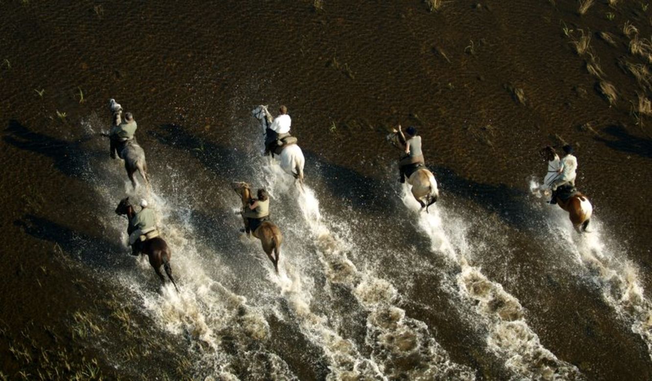 <strong>Okavango Delta, Botswana: </strong>Riders can splash through the canals while tracking wildlife through the lagoons of the largest inland delta in the world.