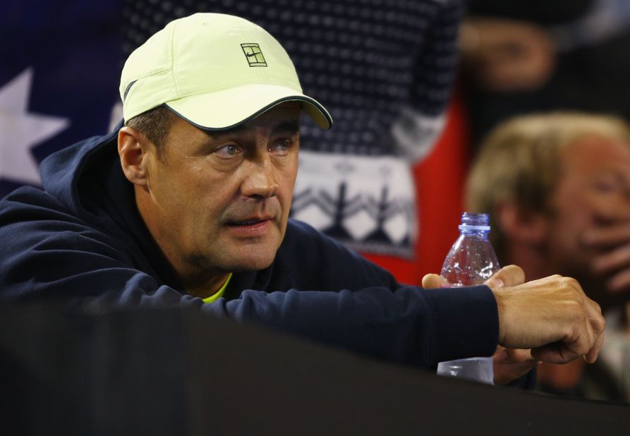 Tomic's father and coach John, pictured, received an eight-month suspended sentence in September after he head-butted the player's former hitting partner Thomas Drouet. He has been banned from attending tournaments. 