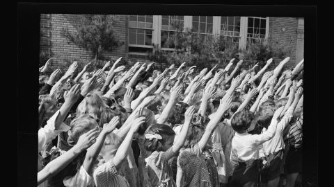 Southington, Connecticut school children pledge their allegiance to the flag, in May 1942.