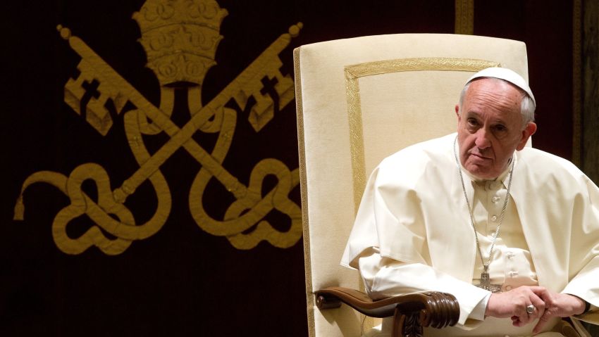 Pope Francis looks on during the audience of the Curia, the administrative apparatus of the Holy See, for Christmas greetings in the Sala Clementina of the Apostolic Palace at the Vatican, on December 21, 2013. AFP PHOTO POOL / CLAUDIO PERICLAUDIO PERI/AFP/Getty Images