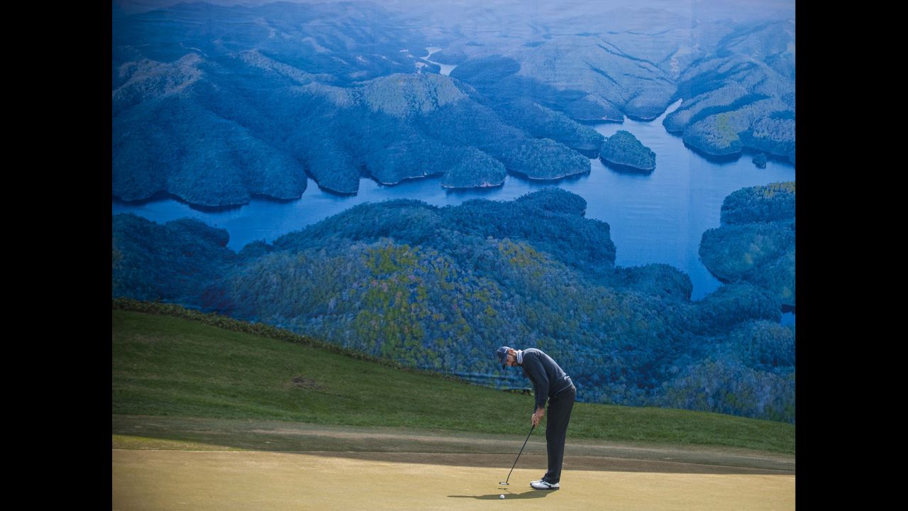 <strong>December 20:</strong> Alvaro Quiros of Spain putts on at the 6th green during the Royal Trophy Europe vs Asia Championship at the Dragon Lake Golf Club in Guangzhou, China.