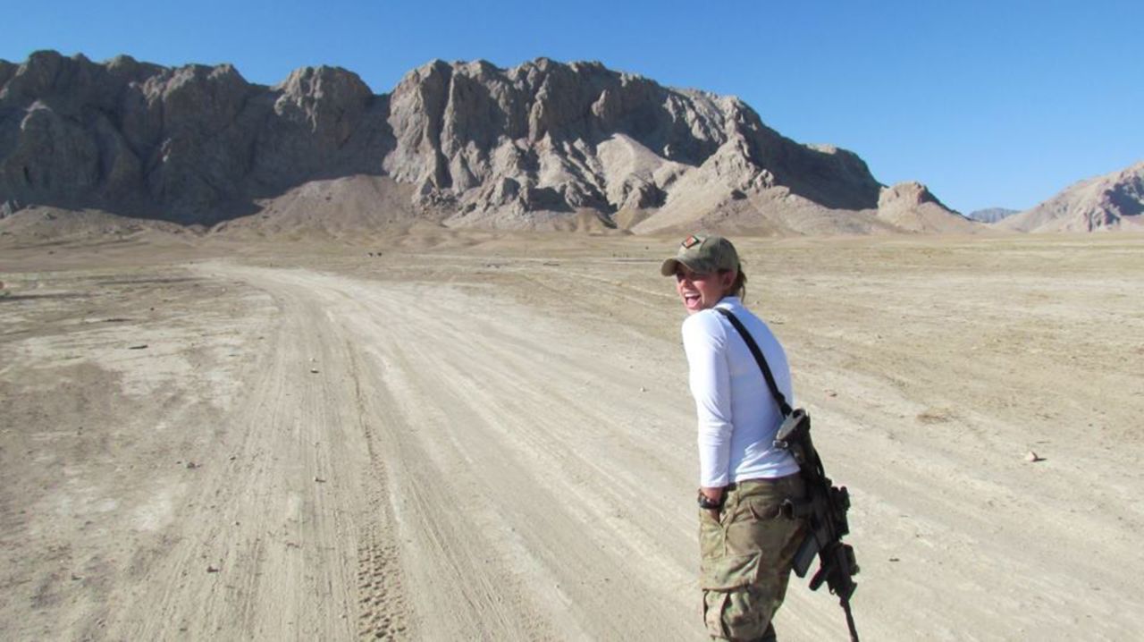 Washburn walks a trail in Afghanistan, which she called a dangerous and stressful mission.