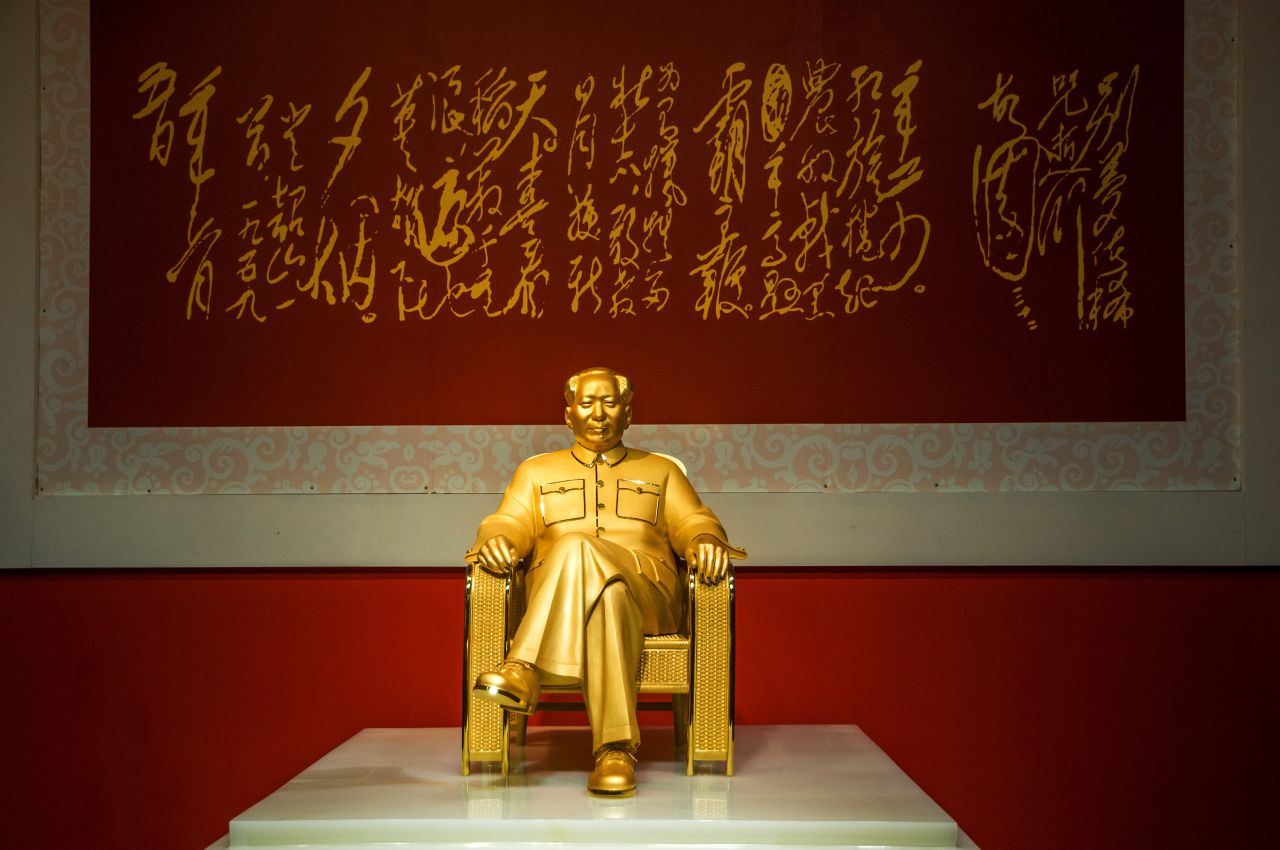 A gold and jade statue of Mao Zedong marks his 120th anniversary at an exhibition in Shenzhen in Southern China on December 13. The statue, is said to be worth more than $16 million.