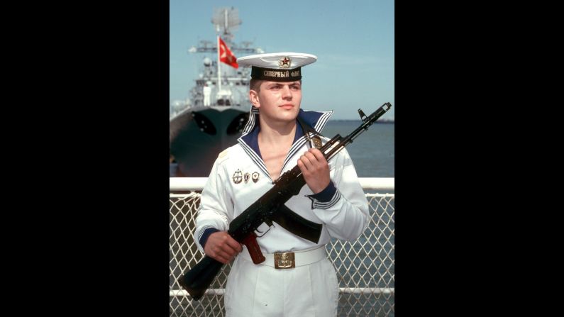 A Russian sailor stands guard with an AK-47 in Moscow during a visit from then-U.S. President Ronald Reagan in 1988.