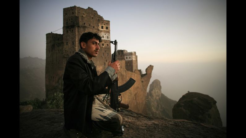 A man guards the the village of Jebel Shugruf in the Haraz Mountains of Yemen in 2006.