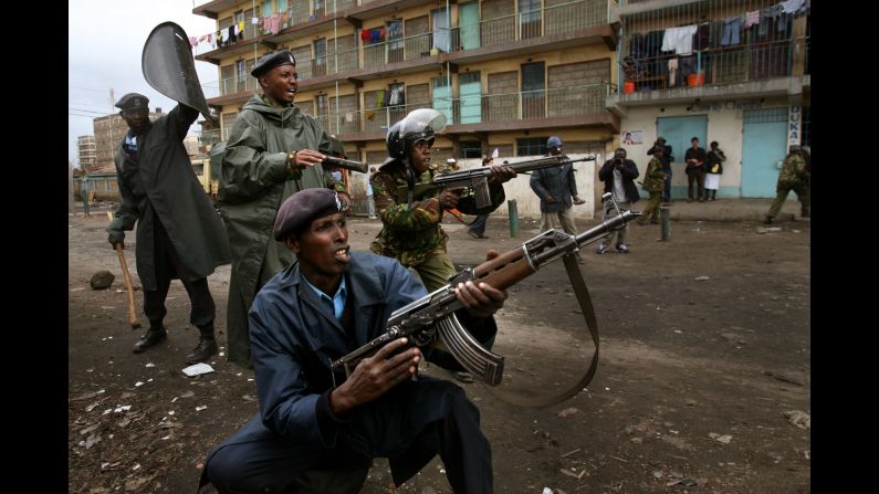 Kenyan policemen confront demonstrators during post-election clashes in the Mathare slums of Nairobi in 2008.