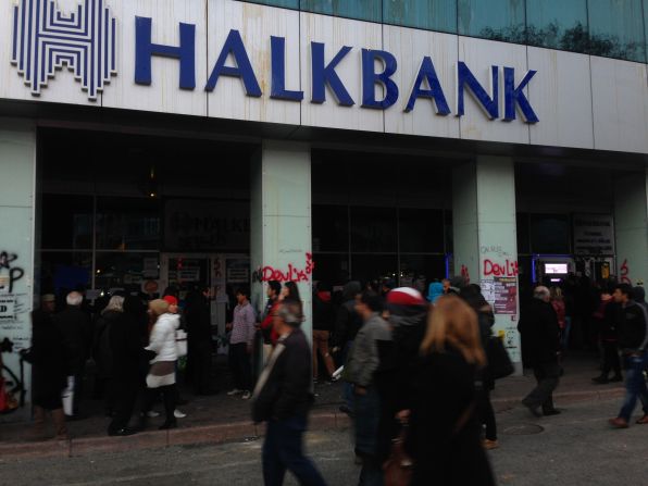 Thousands of demonstrators chanted "help, there are thieves" during the protest in front of a branch of the state-owned Halkbank.