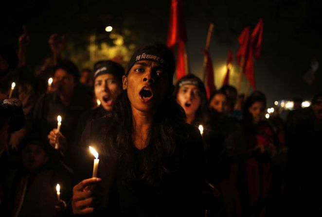 Indians hold a candlelight vigil on the first anniversary of the brutal rape and murder of a young female physiotherapy student in New Delhi on December 16, 2012. Her tragedy awakened the world to the crisis of violence against women in India. 