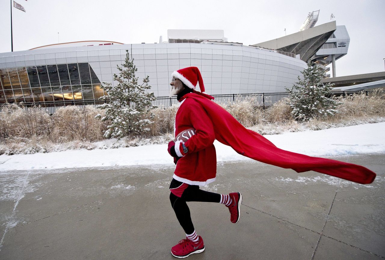 Michael Wheeler of Kansas City, makes one of his seven laps around Arrowhead Stadium on Sunday, December 22, before the game between the Kansas City Chiefs and Indianapolis Colts. The 63-year-old marathon runner performs this ritual before each Chiefs home game.