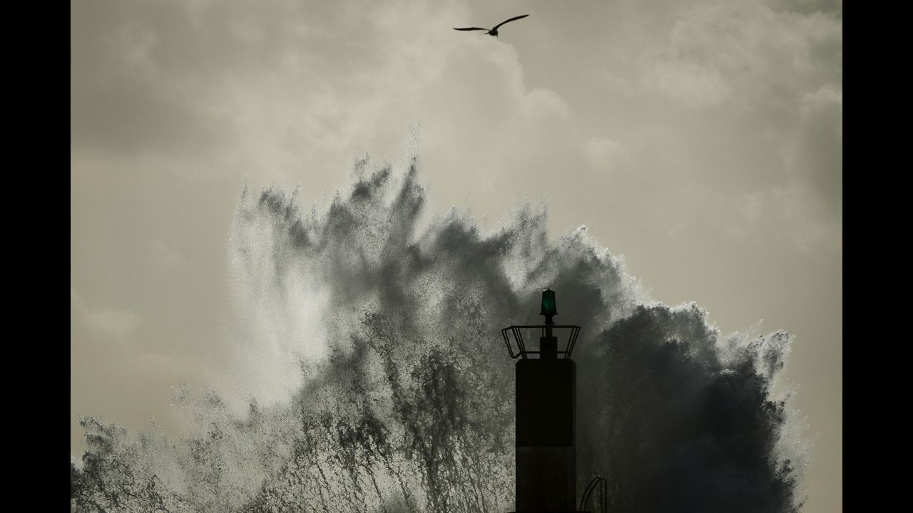 <strong>December 25:</strong> Waves hit the jetty in the port of A Guarda in northwestern Spain. High winds and heavy rain battered parts of Europe on Monday and Tuesday, with some areas still reeling from the aftermath.