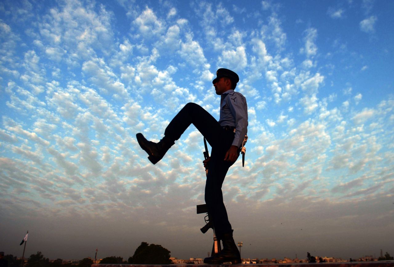 DECEMBER 26 - KARACHI, PAKISTAN: A Pakistani cadet performs a drill during a ceremony on the 137th birth anniversary of Pakistan's founder Mohammad Ali Jinnah (1876-1948) at his mausoleum on December 25. Special ceremonies were also held in other parts of the country.