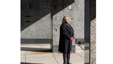 Council Member Yvette Alexander walks outside of the deteriorating Robert F. Kennedy Stadium. - (Charles Ommanney for CNN)