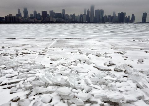 Snow and ice cover Lake Michigan in Chicago, on December 26.
